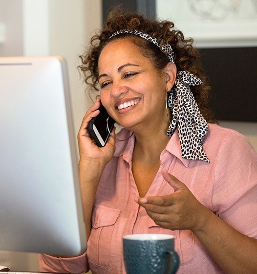 Woman scheduling her cosmetic dentistry consultation