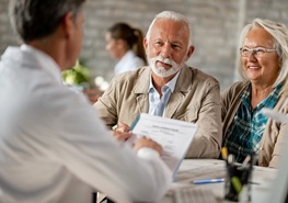 couple at a dental implant consultation