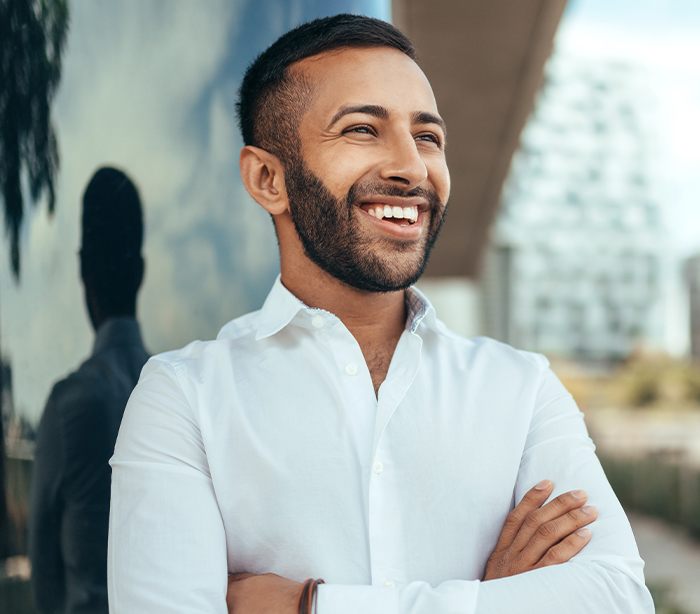 Man with healthy smile after LANAP treatment