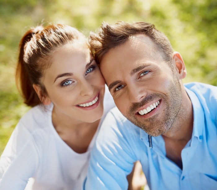 Man and woman sharing healthy smiles